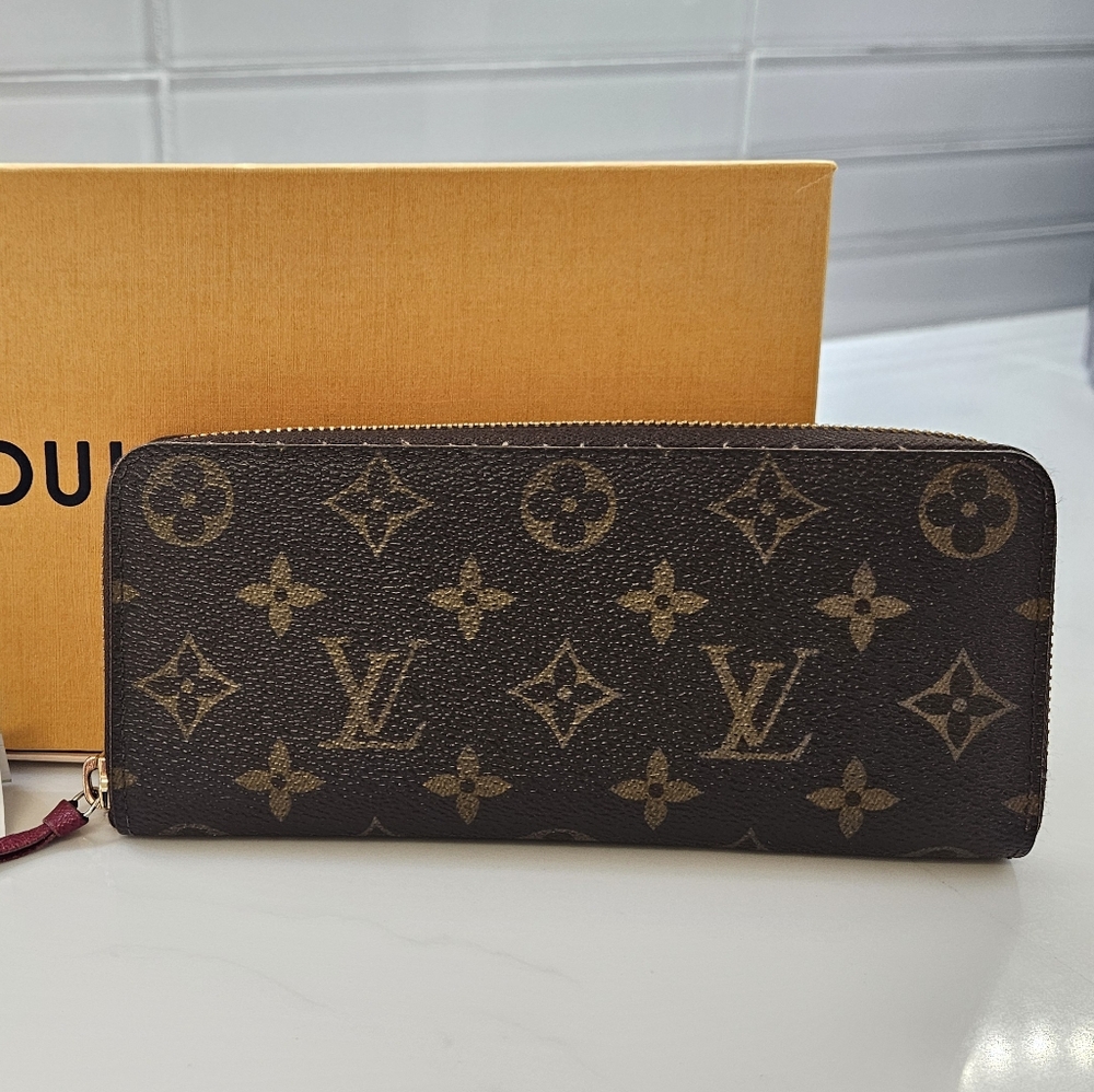 LOUIS VUITTON CLEMENCE WALLET with Fuchsia interior